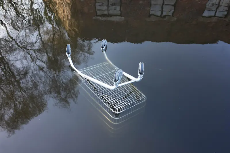A shopping trolly fall in a canal