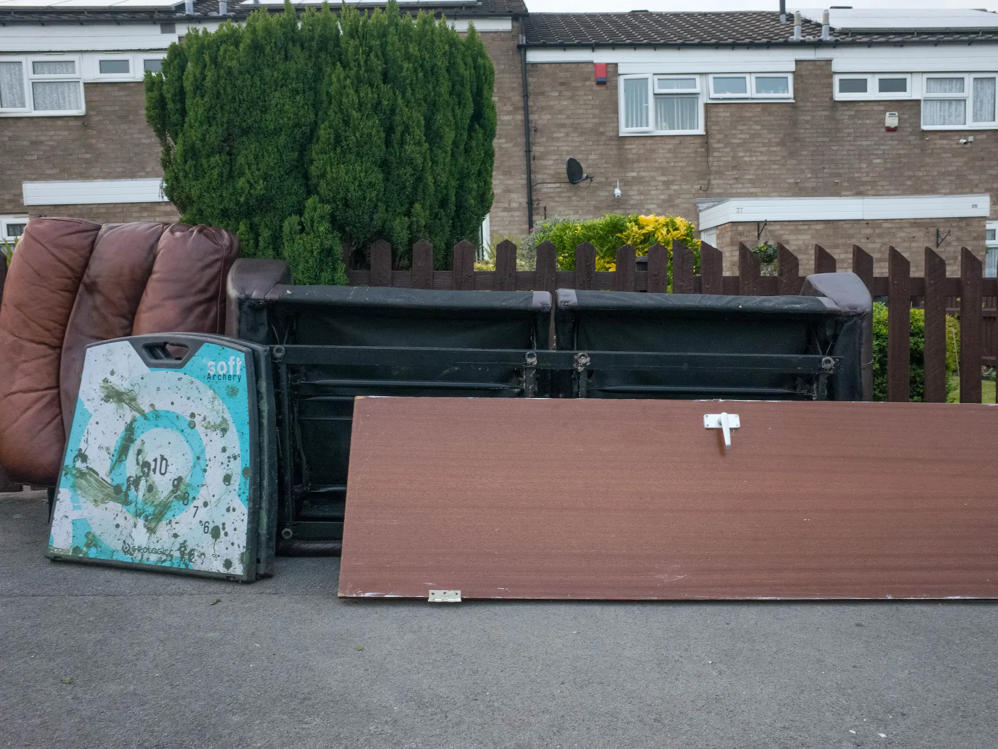 A big sofa leave upside down in street